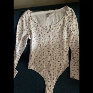 Pink long sleeve bodysuit